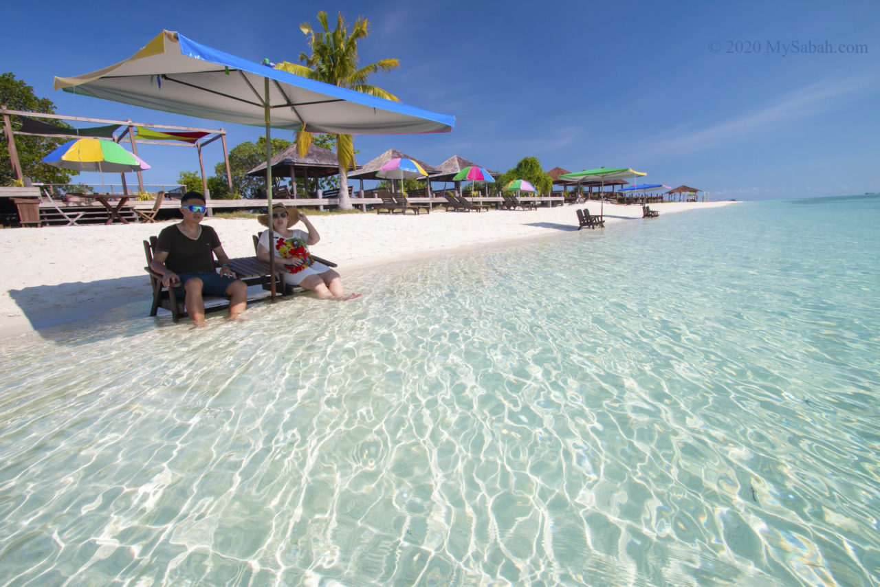 Tourists on the beach chair of Timba-Timba Island