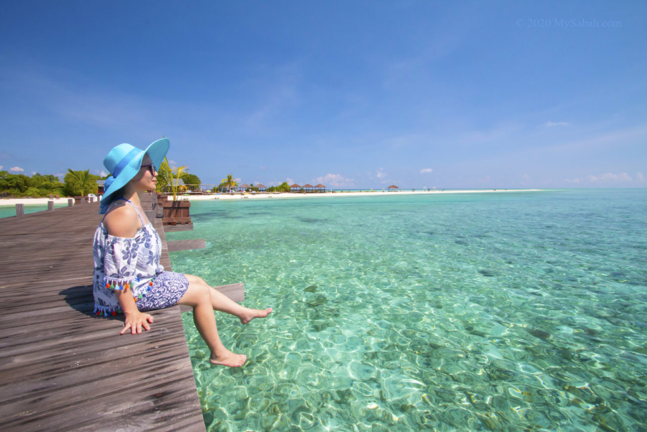 Sitting at the jetty of Pulau Timba-Timba