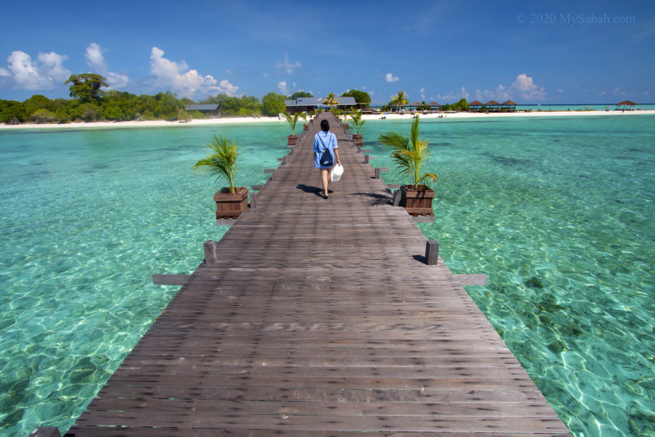 Walking on the boardwalk to Timba-Timba Island