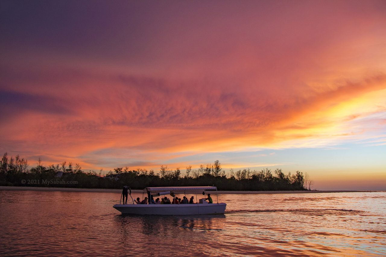 Fiery sunset at the river mouth of Mengkabong River