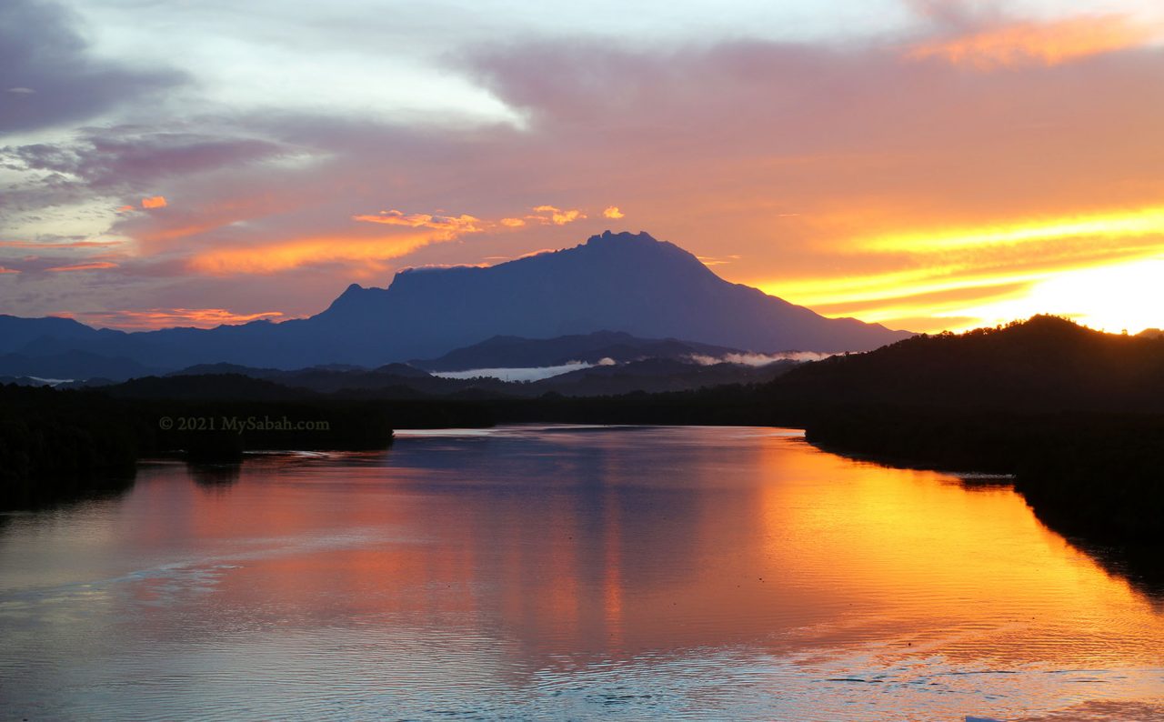 Sunrise over Mount Kinabalu at Mengkabong River Bridge