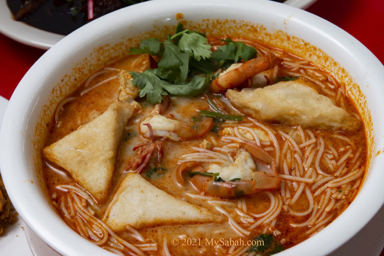 Tom Yam noodle soup with Sandakan fish cake and prawns