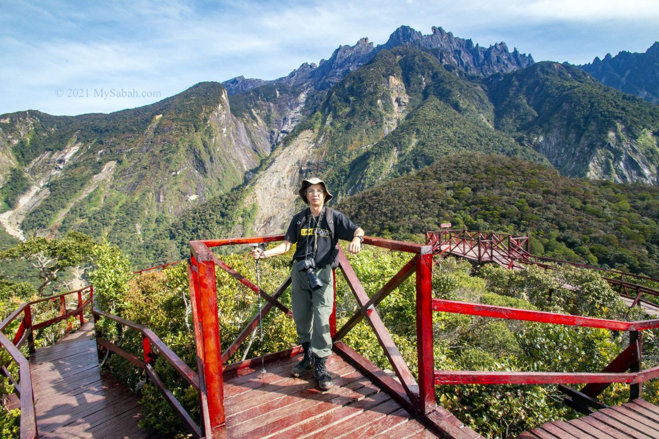 Photo of Calvin Ng on the peak of Maragang Hill