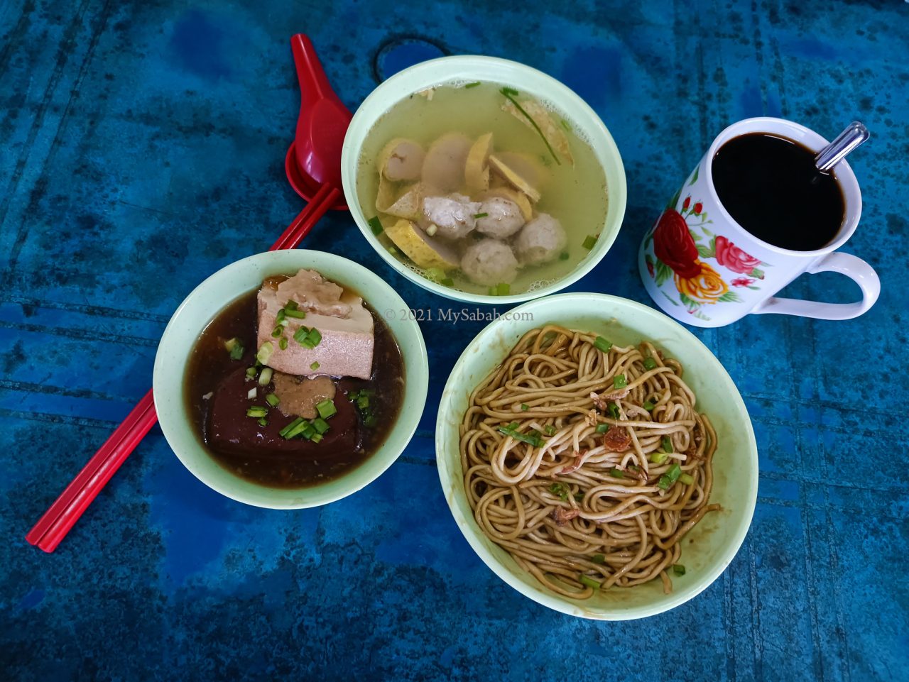 Spring rolls and meat balls, noodle, stuffed tofu and Tenom coffee