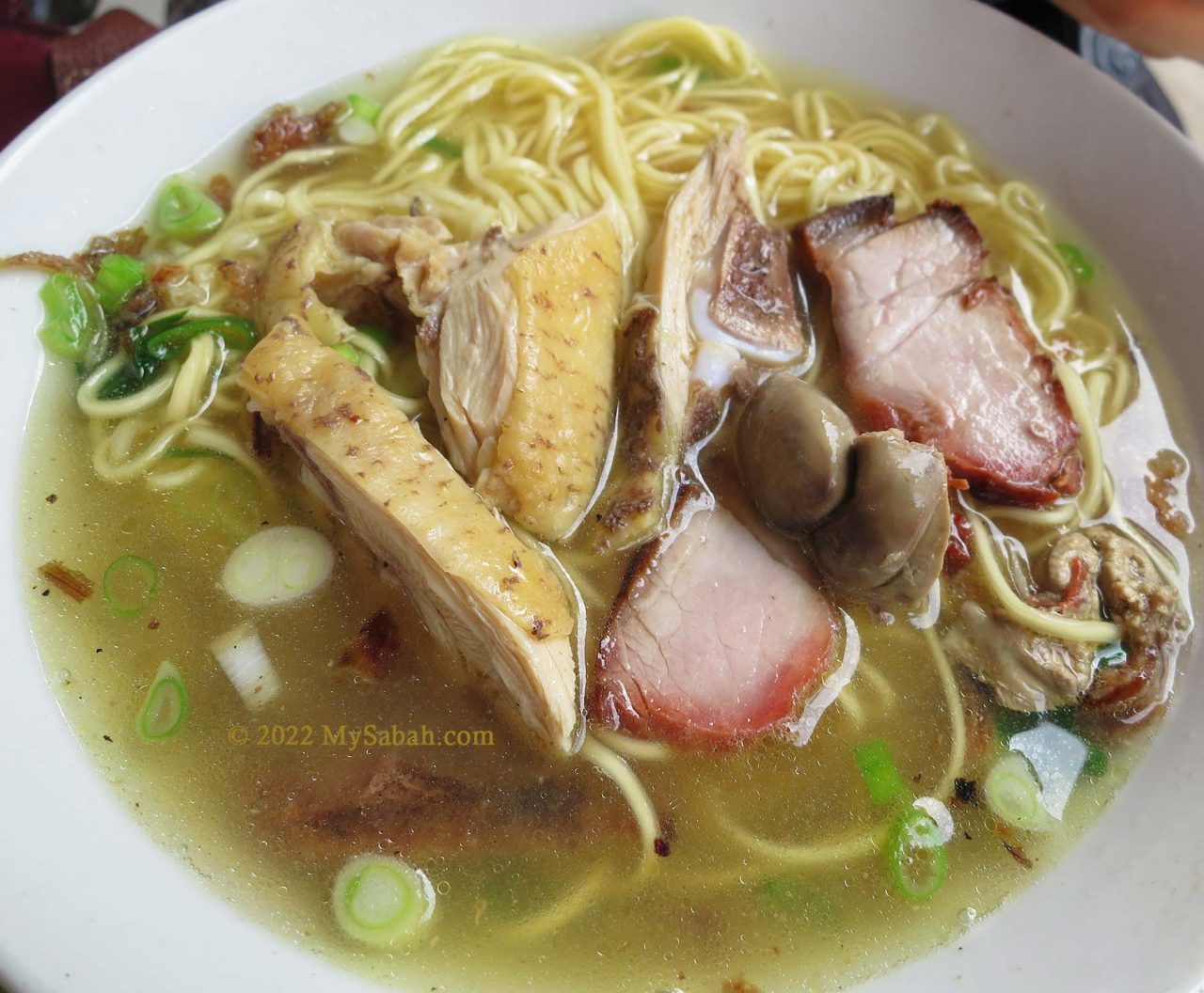 Mee Sup Kota Belud with Cha-Shao (barbecued pork) slices, chicken meat and chicken heart