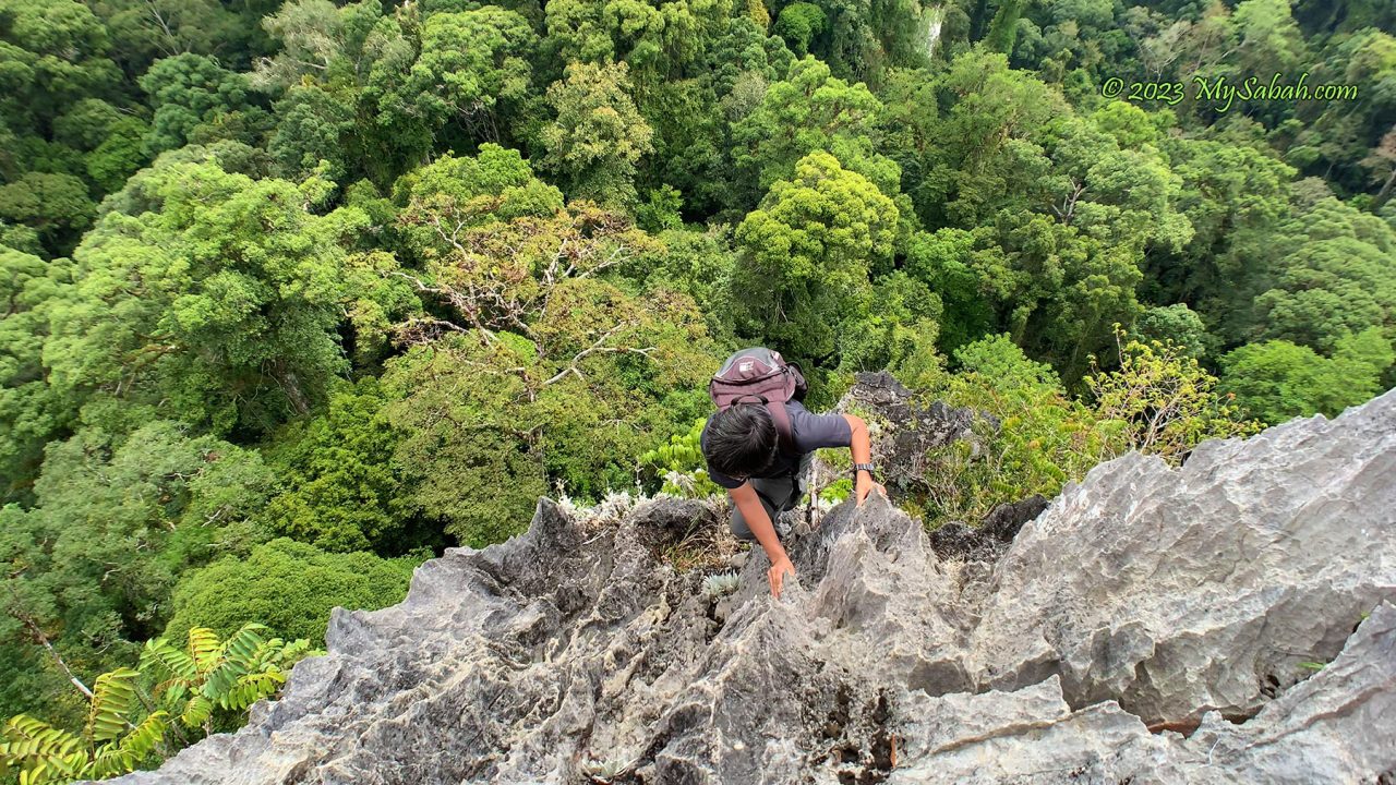 Climbing next to cliff