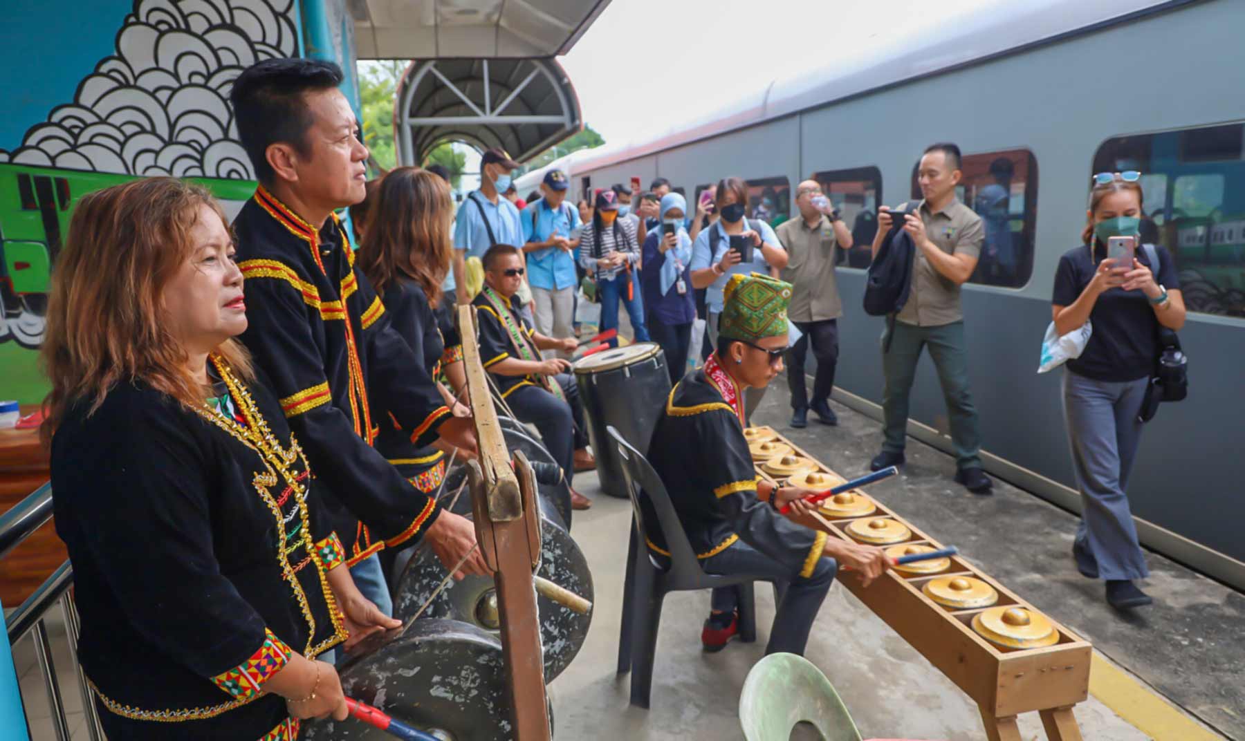 Passengers welcomed by the Papar cultural group at Papar train station