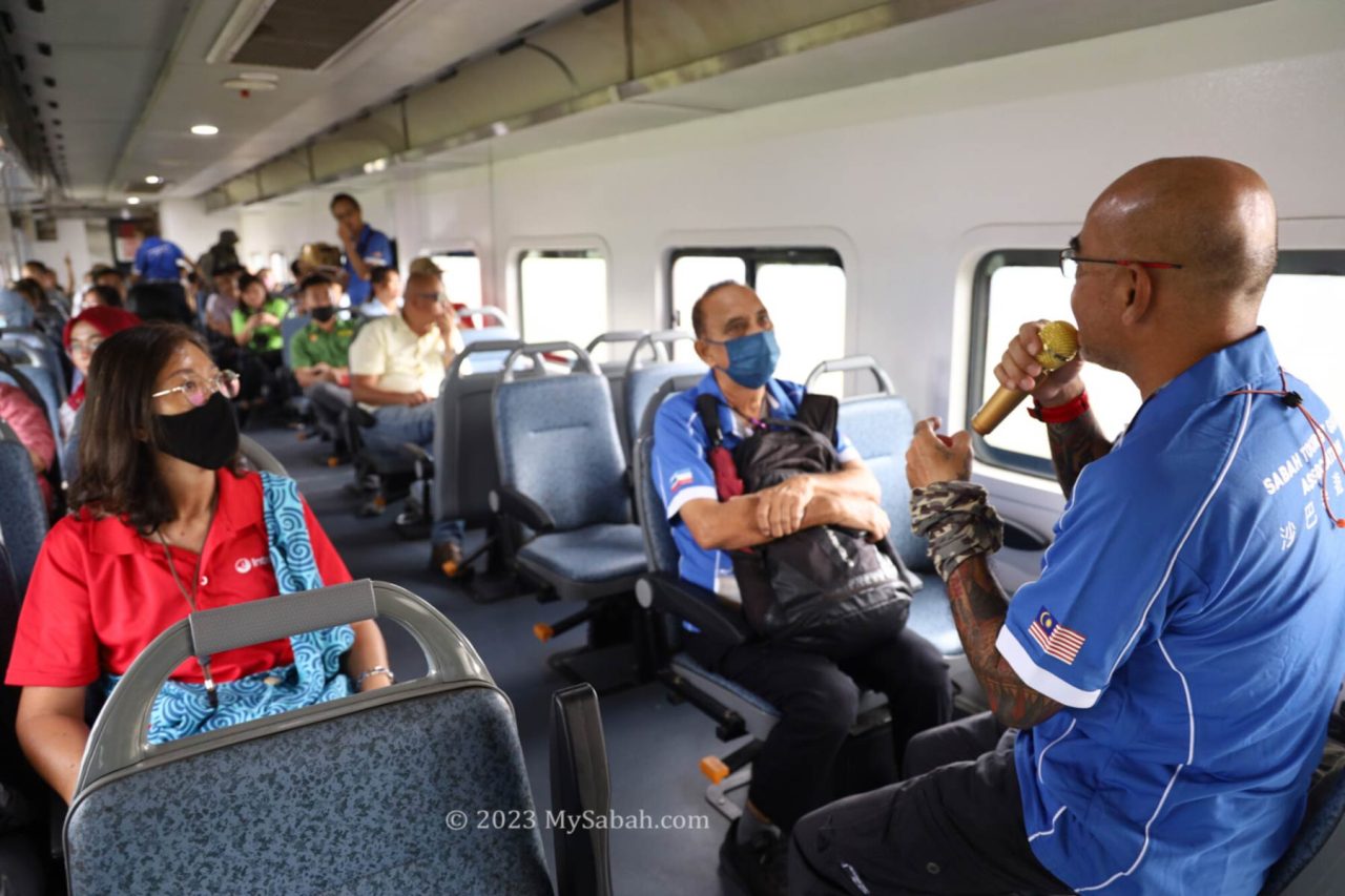 Professional tour guide sharing the stories and history of North Borneo railway