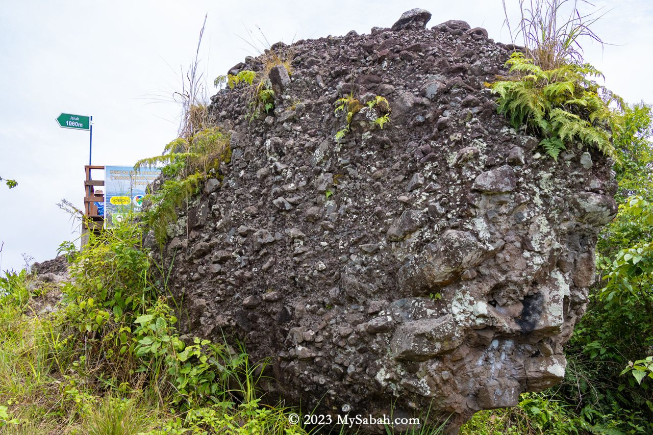 A huge volcanic boulder on the peak of Bukit Panchang