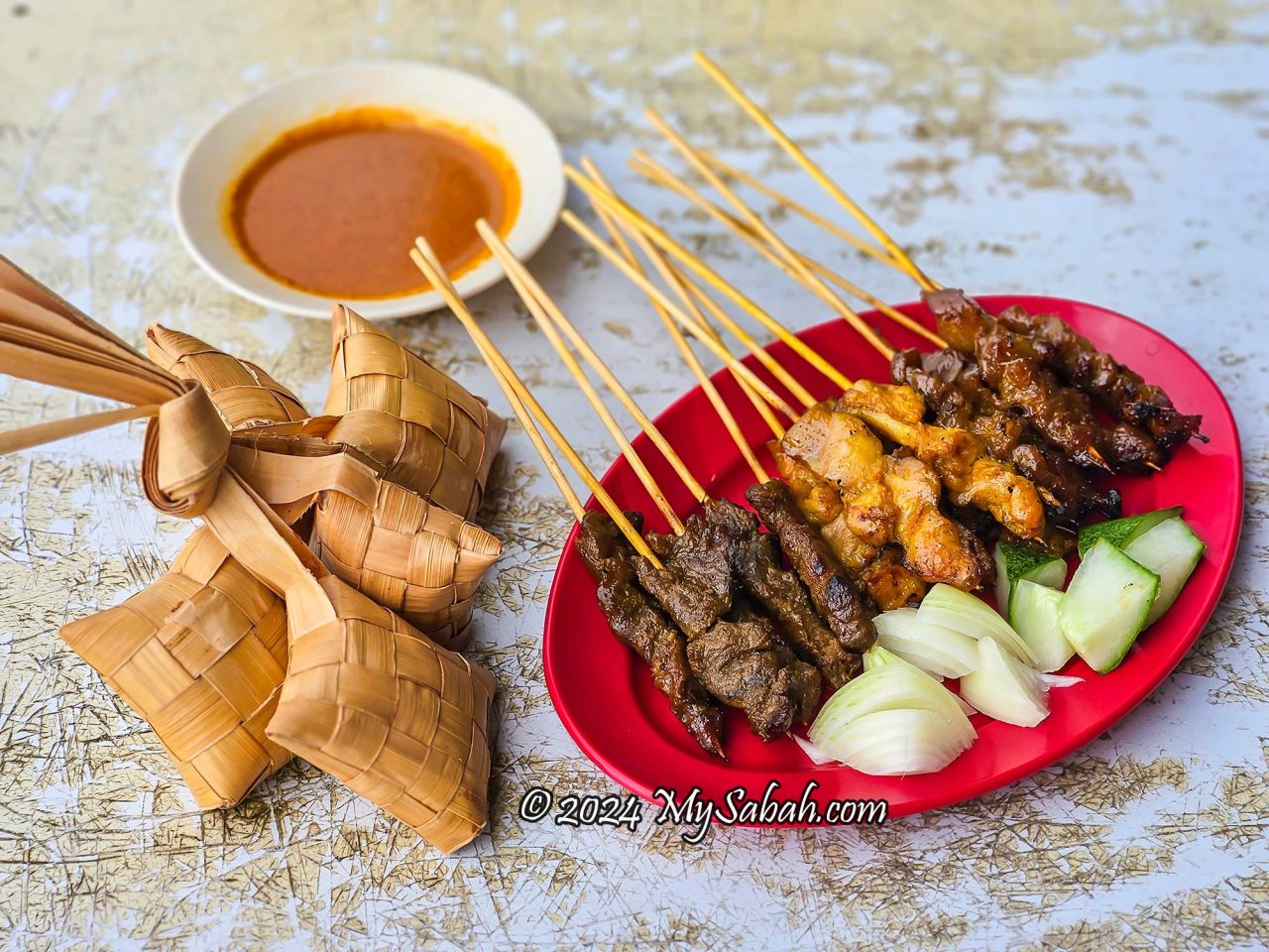 platter of beef, chicken and lamb satay