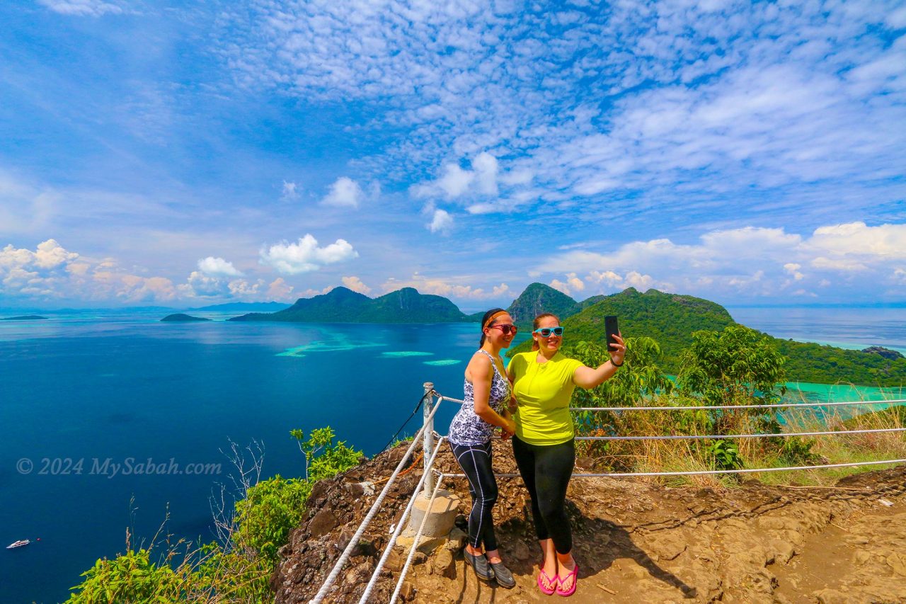 Taking photos on the top of Boheydulang Island