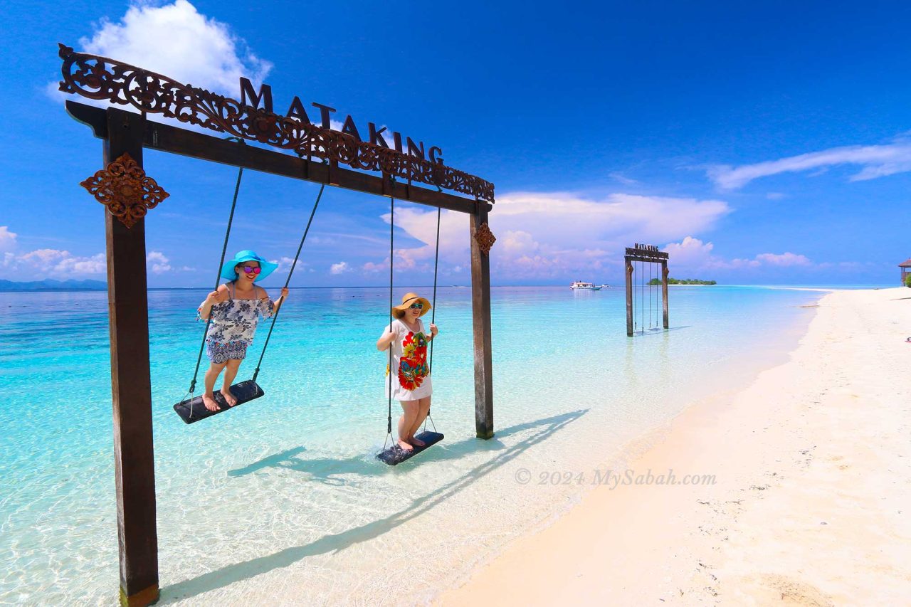 Swing on the beach of Mataking Island