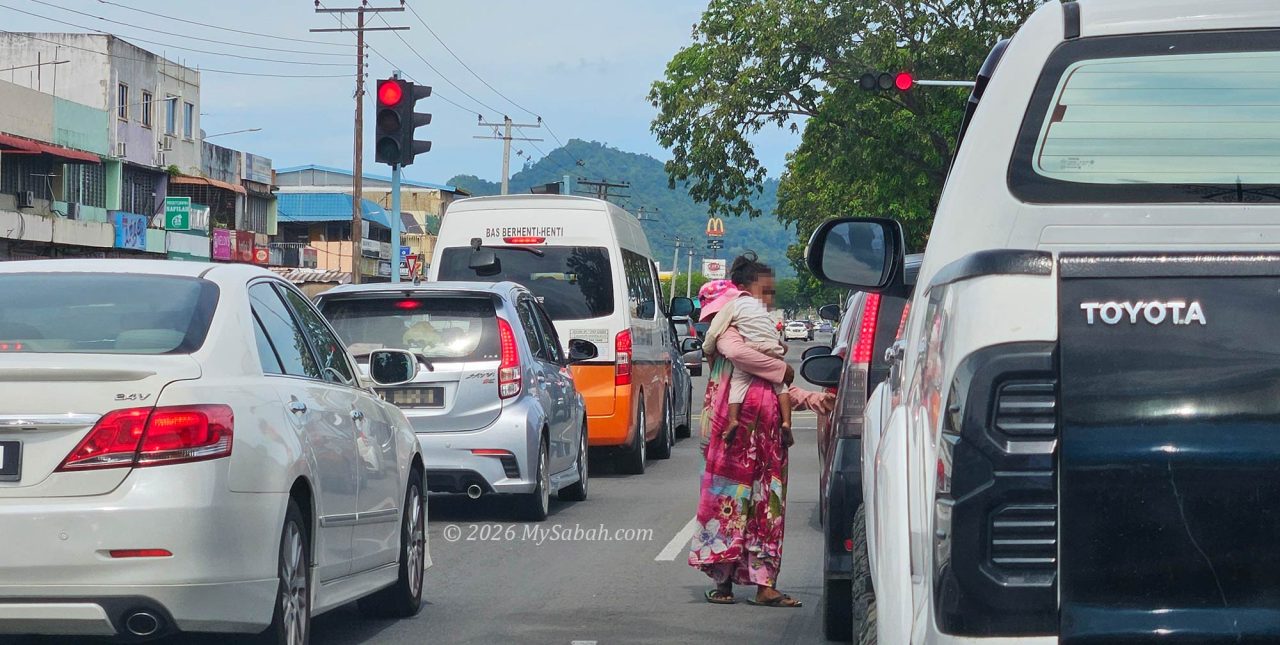 Stateless people begging in coastal towns and cities of Sabah