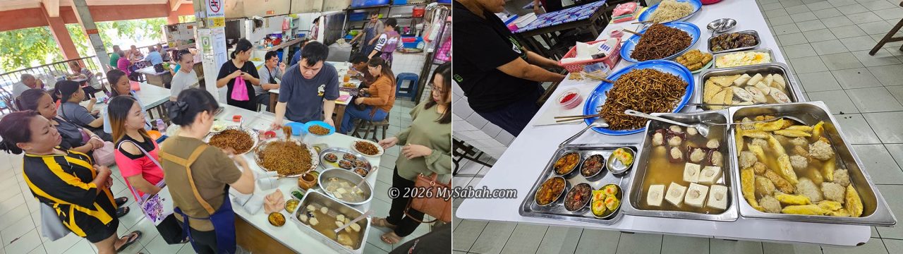 A busy breakfast food stall at the Kudat market
